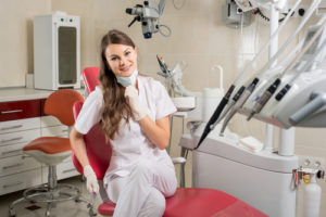 female dentist in dental chair